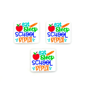 Eat sleep school repeat silicone focal bead