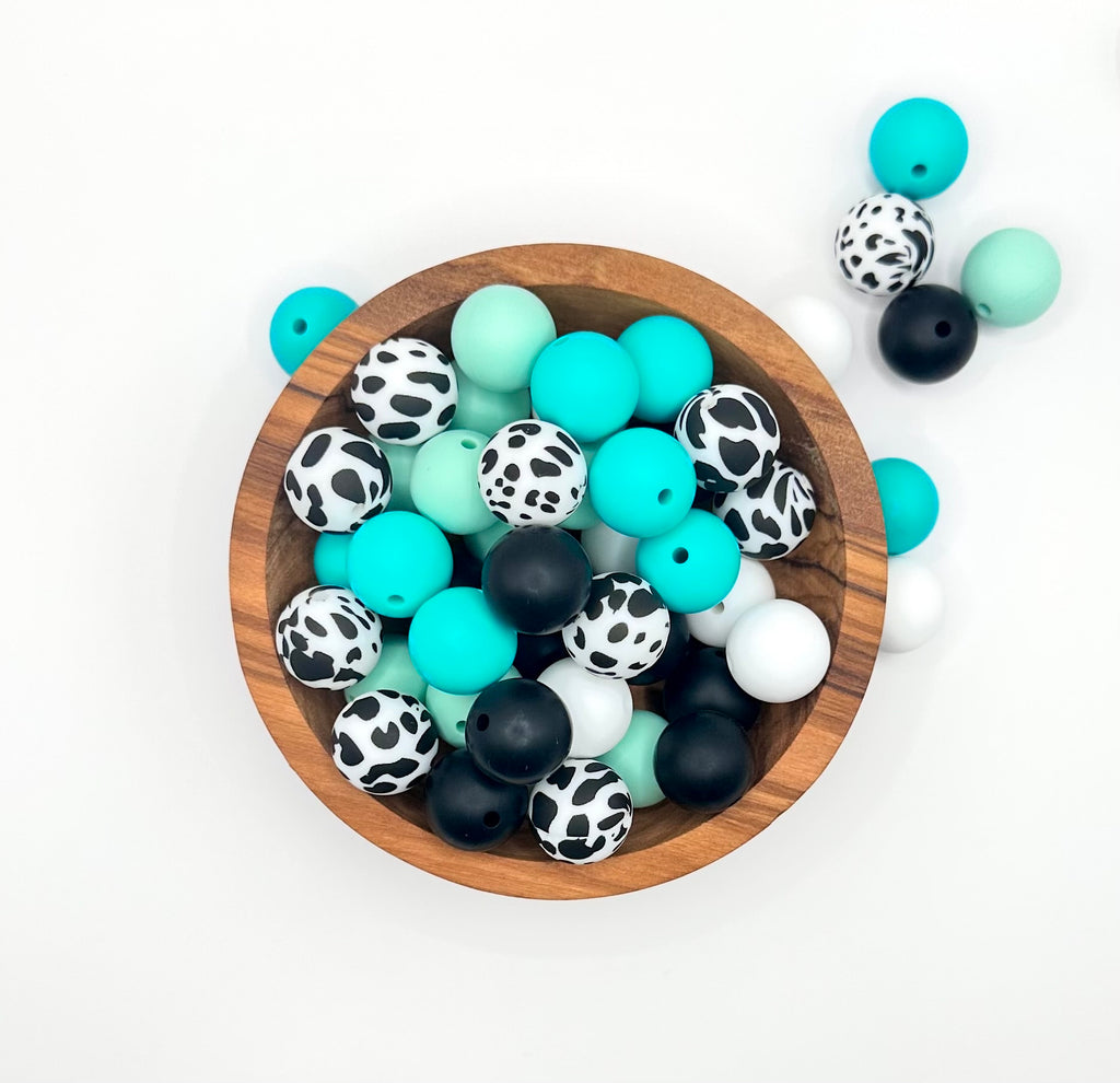 Turquoise cow print 15mm mix (50 beads total)