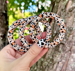 Burnt orange daisy cow print (HBK exclusive) 65MM silicone ring