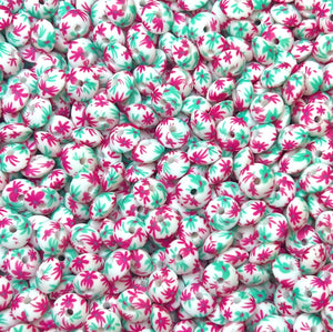 12mm turquoise & hot pink daisy (HBK exclusive) silicone lentil bead